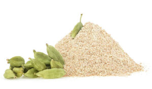 Cardamom ground pods and pile of ground cardamom isolated on a white background. Cardamomum seasoning or elaichi.